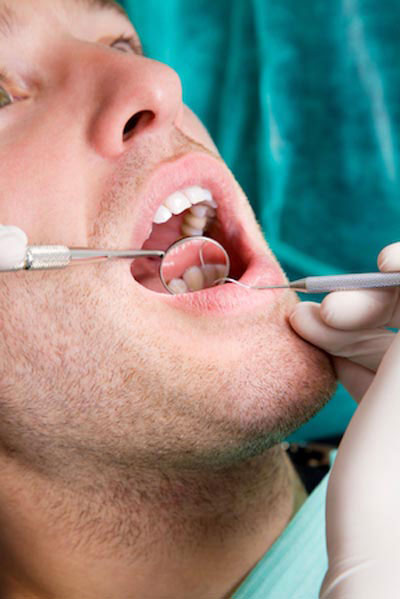 patient receiving dental services in Victoria, BC